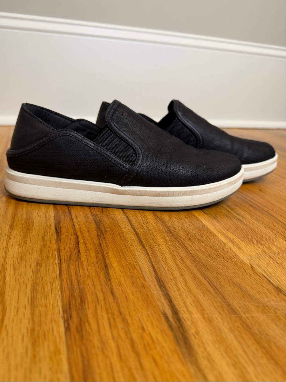 OluKai Ki’ihele ‘Ili Black Leather Slip-On Sneakers | Women’s 8.5 - Black
